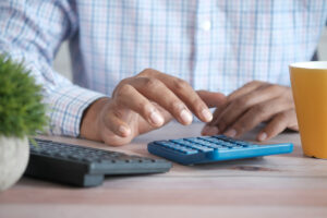 Auditor using etrack crm and calculator