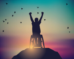 Goal-focused NDIS participant celebrating independence and achievement outdoors