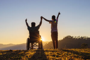 NDIS Participant with service provider on top of a hill